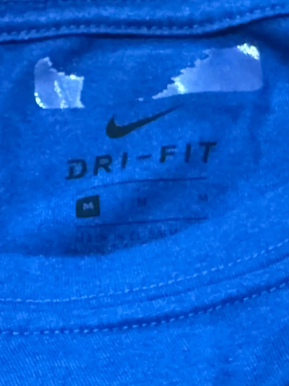 Nike Blue Long-Sleeve Dri-Fit Tee with Yellow Swoosh